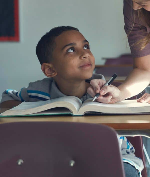Young boy learning in afterschool program